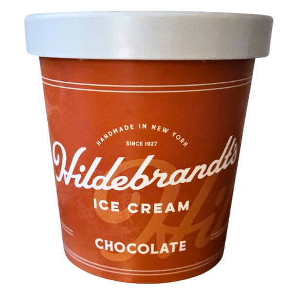 A pint of Hildebrandt's chocolate ice cream with a white lid on a white background.