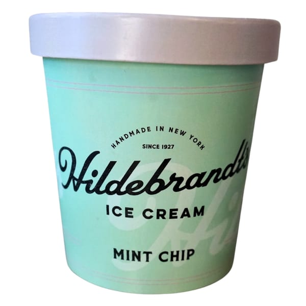 A mint green Hildebrandt's ice cream pint with a light gray lid, labeled "Mint Chip".