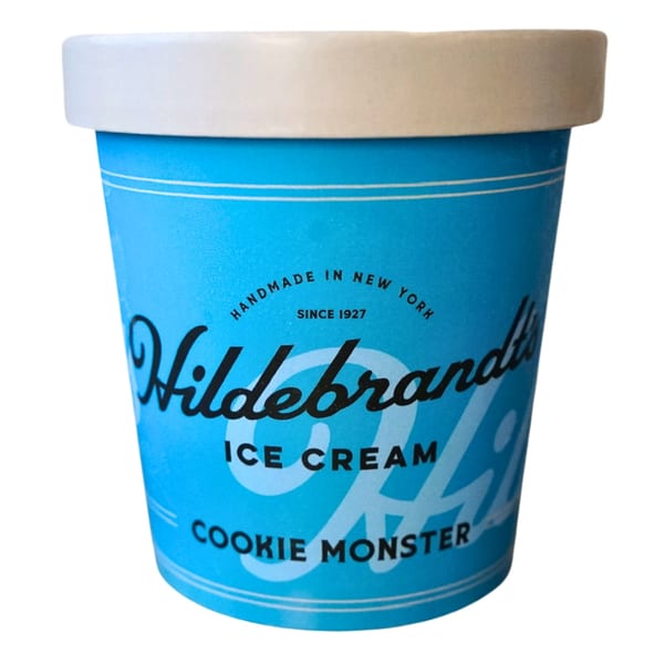 Hildebrandt's Cookie Monster ice cream pint, light blue with black and white lettering.