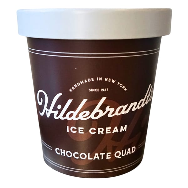 A pint of Hildebrandt's Chocolate Quad ice cream with a white lid.